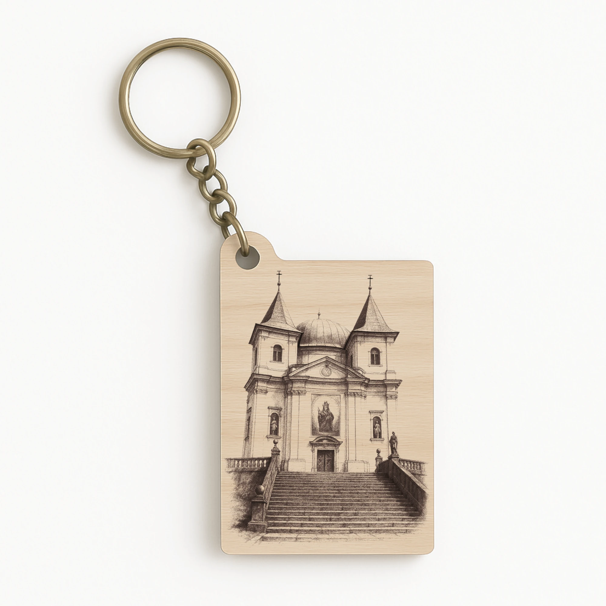 Dřevěná klíčenka s gravírováním baziliky Svatý Hostýn, obdélníkový tvar s kovovým kroužkem, vhodná jako poutní suvenýr.