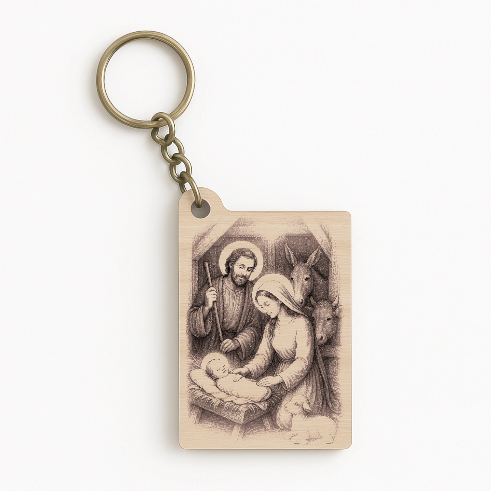 Dřevěná klíčenka s motivem Betlémské stáje a Svaté rodiny, precizně gravírovaná do bukové překližky.