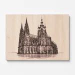 Detail dřevěného obrazu Katedrály svatého Víta, Václava a Vojtěcha s precizním gravírováním gotické architektury Pražského hradu